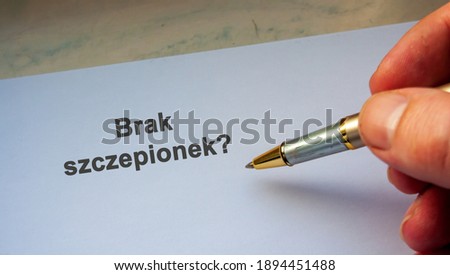 Polish question BRAK SZCZEPIONEK. English= No vaccines on a piece of notebook paper. Coronavirus vaccine choice. Vaccination supporters and opponents.