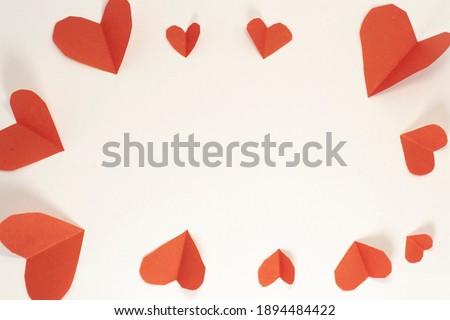frame from paper hearts on white isolated background. valentine's day cards with copy space