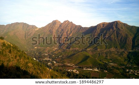 Beautiful landscape picture with mountains and sunlight