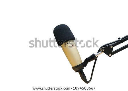 Speech microphone presents content on white background. In the recording room.
