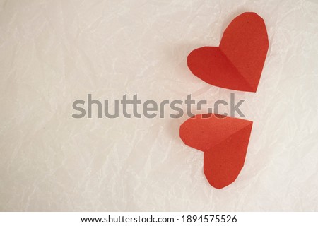 valentine's day cards on white crumpled paper. valentines on a crumpled background with a place for an inscription copy space, mock up