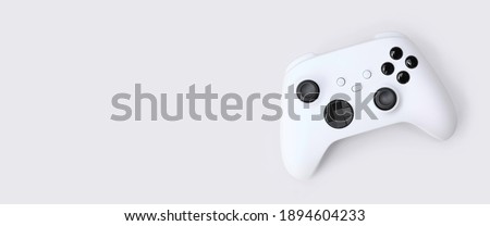 White Next Gen game controller isolated Royalty-Free Stock Photo #1894604233