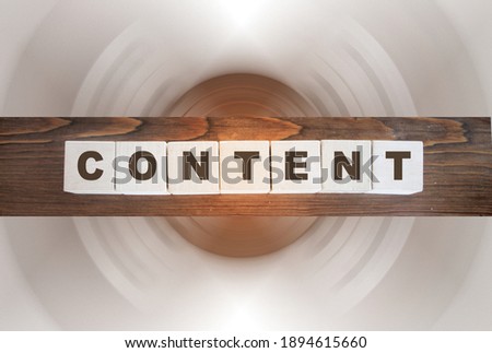 Content - word from wooden blocks with letters, SEO CRM business concept.