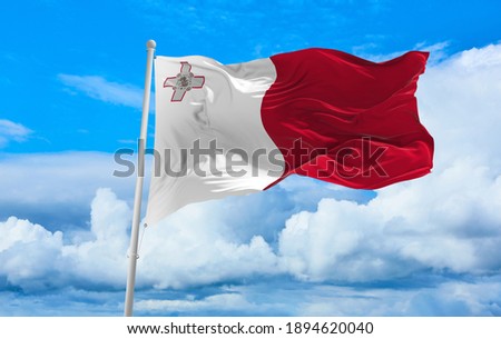 Large Malta flag waving in the wind Royalty-Free Stock Photo #1894620040