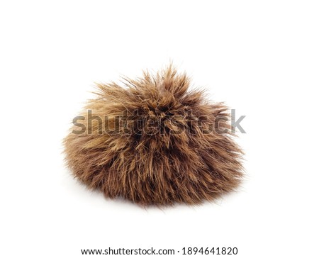 A ball of fur isolated on a white background.