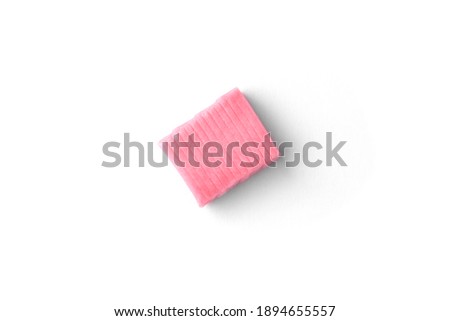 Pink fruit chewing candy isolated on white background. Royalty-Free Stock Photo #1894655557