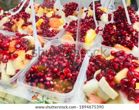
Pomegranate salad sold in transparent boxes on the street