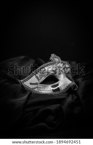 Venice carnival mask on black background