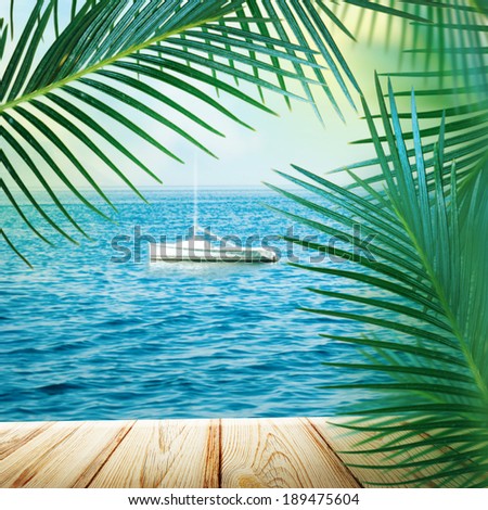 Sea background with palm leaves.