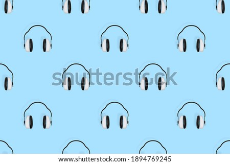Headphones seamless pattern. Seamless pattern on the theme of headphones, music.