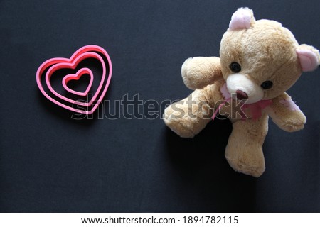 teddy bear and pink hearts on black background, Valentine's Day gifts, advertising banner