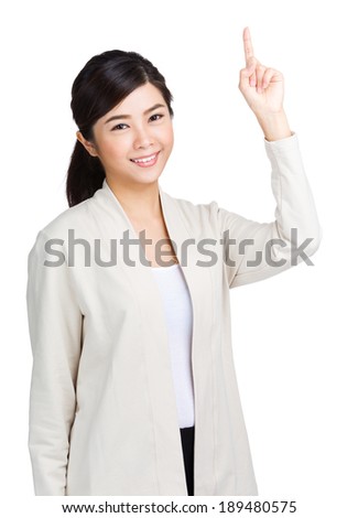 Young Asian woman pointing 