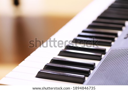 Close up old Piano key for background photo. Selective focus. Royalty-Free Stock Photo #1894846735