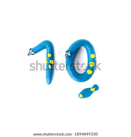 Number 10 made from colorful plasticine isolated on white background. Learning numbers with child.