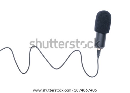 Condenser microphone with wire isolated on white background. Sound recording equipment.