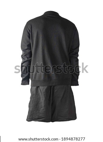 knitted black sweater and black shorts isolated on white background. fashionable clothes for every day