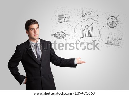 Business man presenting hand drawn sketch graphs and charts concept