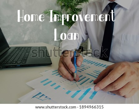 Conceptual photo about Home Improvement Loan with handwritten phrase.
