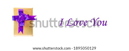  this photo illustrates the festive atmosphere. the photo shows a gift. gift box on a white background. valentine's day concept. the inscription on the image I love you