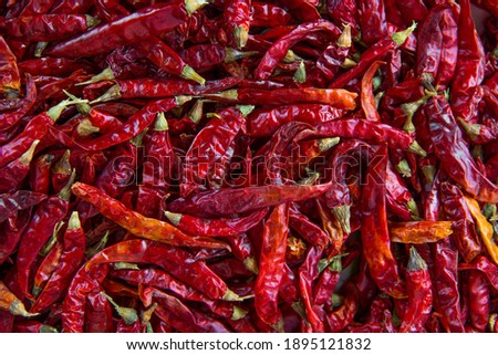 Red dry chilli texture background isolated