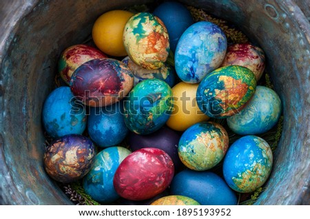 Easter eggs, Paschal eggs, decorated with spring herbs, flowers, onions skin and natural colours - to celebrate Easter. Its old tradition in Lithuania, Eastern Europe	