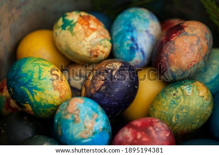 Easter eggs, Paschal eggs, decorated with spring herbs, flowers, onions skin and natural colours - to celebrate Easter. Its old tradition in Lithuania, Eastern Europe	
