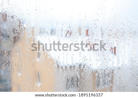 The texture of fogged glass on the window .