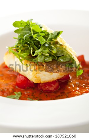 Halibut Fillet with Tomato Sauce and Rucola
