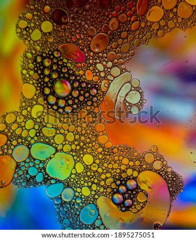 Soap bubbles with colorful abstract background