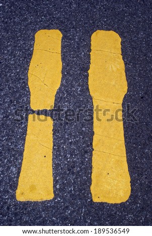 Yellow lines on road pavement 