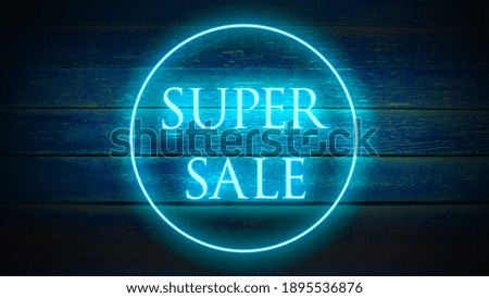 Bright Blue Neon super sale on the wooden background. Glowing advertising design.