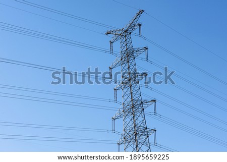Tower high voltage line under the background of blue sky 