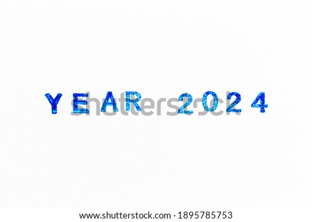 Blue color ink of rubber stamp in word year 2024 on white paper background