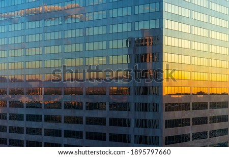 Citycape reflection of Denver downtown at sunrise, Colorado, United States of America (USA).