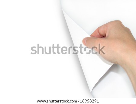 A hand is turning a page over. The page is white and blank so you can add your text. Royalty-Free Stock Photo #18958291