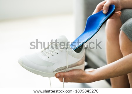 Shoe Sole In Footwear For Healthy Foot Arch Royalty-Free Stock Photo #1895845270