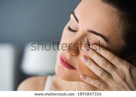 Tired Exhausted Eye Pain And Ache Problem Royalty-Free Stock Photo #1895847316