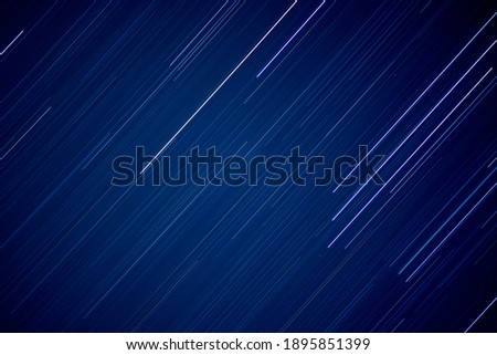 star trails in the blue sky. its an astro photo. like us illustration, abstract, background and textures