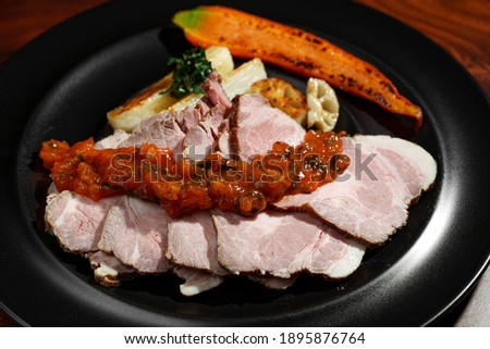 Low temperature cooked roast pork