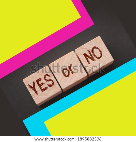 Words YES or NO on wooden blocks. Business and career, education choice concept.