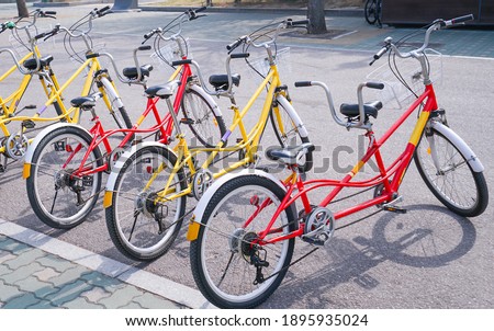Bicycles stands in a row in the street stock photo.              
