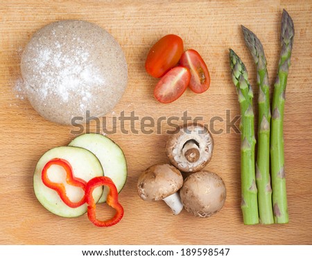 Ingredients for healthy pizza with vegetables