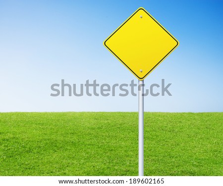 blank sign on with green grass background.