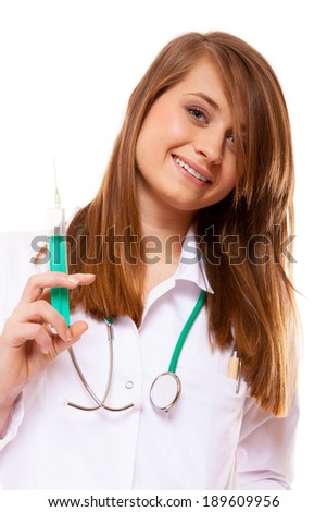 Doctor woman or nurse young female with stethoscope holds a medical syringe, healthcare concept, isolated on white background