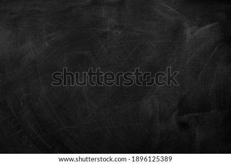 Texture of chalk on black chalkboard or blank blackboard background. School education, dark wall backdrop, template for learning board concept.