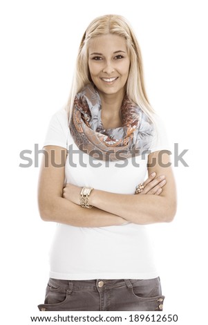 Isolated portrait of attractive blonde successful woman with crossed arms on white.