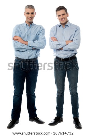 Full length picture of a casual men, arms folded