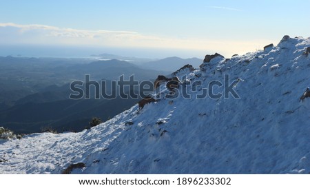 snowy panorama in the natural park of gennargentu, Talana in Ogliastra Sardinia, land of centenarians, blue zone.