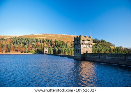 View of Derwent Dam and Reservoir, Peak District National Park, Derbyshire, UK. Derwent Reservoir is the middle of three reservoirs in the Upper Derwent Valley in the north-east of Derbyshire, England Royalty-Free Stock Photo #189626327