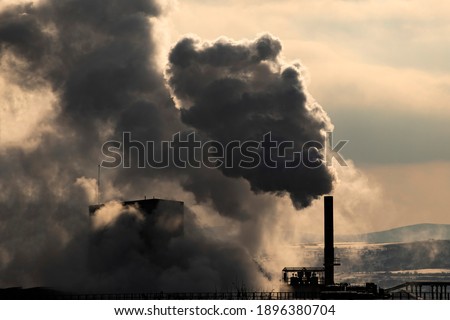 Air pollution from power plant chimneys. Royalty-Free Stock Photo #1896380704